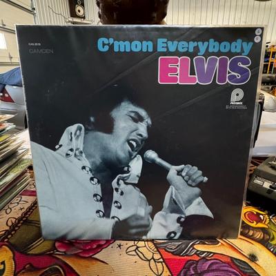 Sale Photo Thumbnail #90: Elvis Presley album C'mon Everybody. 
Here's more information about the album:
Release Details: It's a compilation album released by RCA Camden on July 1, 1971.
Content: The album features ten songs from Elvis's motion pictures, which were previously rele