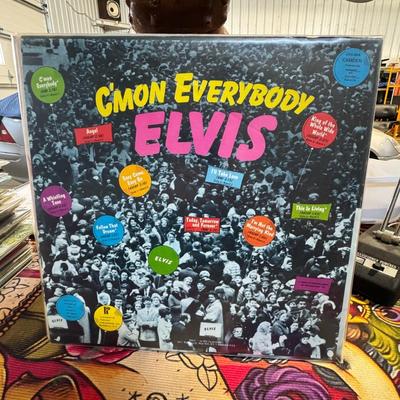 Sale Photo Thumbnail #91: Elvis Presley album C'mon Everybody. 
Here's more information about the album:
Release Details: It's a compilation album released by RCA Camden on July 1, 1971.
Content: The album features ten songs from Elvis's motion pictures, which were previously rele