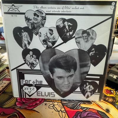 Sale Photo Thumbnail #119: "For The Love Of Elvis", a 12" vinyl LP (33 RPM) released in 1977 by Super-Star Records, with the catalog number SS 110. 
This album is a compilation featuring:
Interviews: It includes one of Elvis Presley's earliest and most intimate interviews, specific