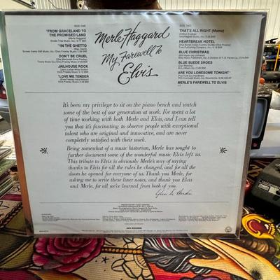 Sale Photo Thumbnail #209: Merle Haggard's My Farewell to Elvis, released in 1977. This album is also known by the title of its lead single, "From Graceland to the Promised Land". 
Here are some key details about the album:
Tribute Album: It's a tribute album dedicated to Elvis Pre