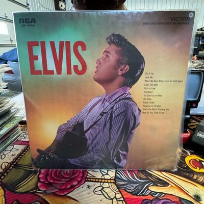 Sale Photo Thumbnail #152: Elvis Presley self-titled album, often called "Elvis," released by RCA Victor with catalog number LSP-1382(e). 
Key details about this album:
Artist: Elvis Presley.
Release Date: February 1962, for the stereo reprocessed version (LSP). The original mono r