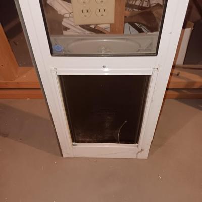 PET DOOR FOR A SLIDING GLASS DOOR AND A LARGE PET KENNEL