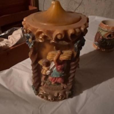 BEER STEINS, SWISS GIRL FIGURINE AND A CARVED CANDLE