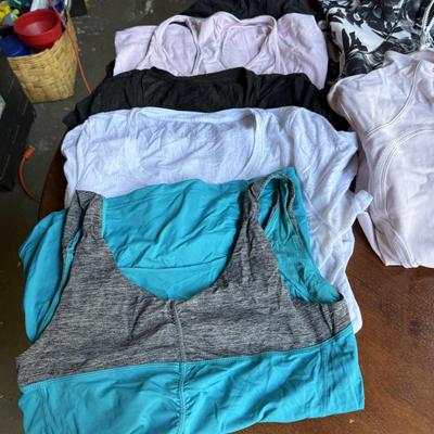 Sale Photo Thumbnail #103: This is for a lot of Lululemon workout pants, shirts, and jackets. Most are size medium.