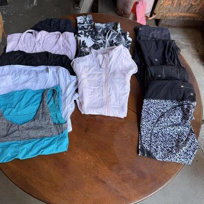 Sale Photo Thumbnail #99: This is for a lot of Lululemon workout pants, shirts, and jackets. Most are size medium.