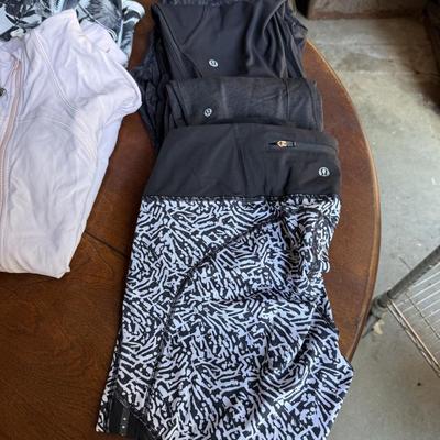 Sale Photo Thumbnail #101: This is for a lot of Lululemon workout pants, shirts, and jackets. Most are size medium.