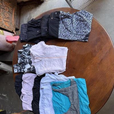Sale Photo Thumbnail #100: This is for a lot of Lululemon workout pants, shirts, and jackets. Most are size medium.