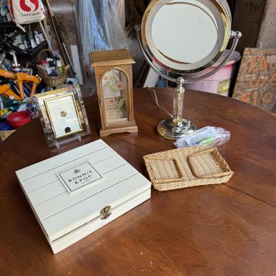 Sale Photo Thumbnail #104: This slot has a cute jewelry box in it. Folding handle basket, A storage box, A picture frame a lighted up mirror.