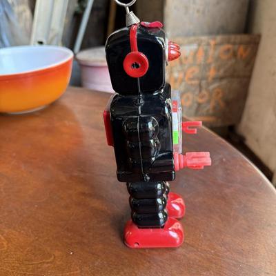 Sale Photo Thumbnail #146: This is for a vintage wind up robot. It needs to have the wind up part text. Other than that it’s in good condition.