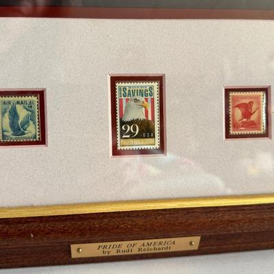 Sale Photo Thumbnail #144: Matted and Framed Print and Postage Stamps:  3cent and 6 cent Eagle Air Mail stamps, also a 29 cent Eagle US Savings Bond stamp. Framed size approx. 22" x 16".