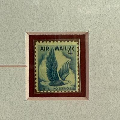 Sale Photo Thumbnail #145: Matted and Framed Print and Postage Stamps:  3cent and 6 cent Eagle Air Mail stamps, also a 29 cent Eagle US Savings Bond stamp. Framed size approx. 22" x 16".