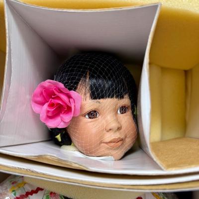 Sale Photo Thumbnail #71: New in original box, comes with original documentation and tags.  Wearing a traditional costume from Spain. Still wrapped in original bubble wrap.