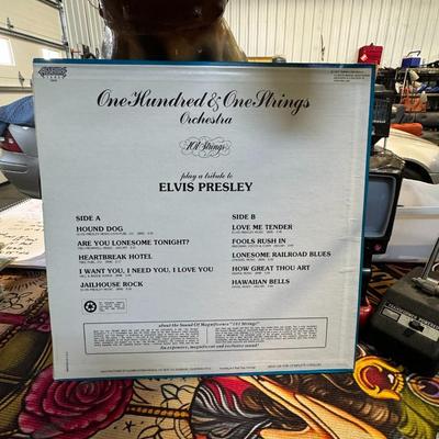 Sale Photo Thumbnail #530: "One Hundred & One Strings Orchestra Play A Tribute To Elvis Presley". 
Here is more information about the album:
Artist: The One Hundred & One Strings Orchestra, also known as the 101 Strings Orchestra, performs the album. The orchestra is a successful e