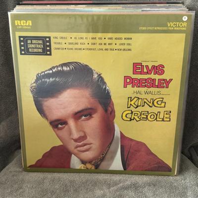 Sale Photo Thumbnail #9: King Creole, the soundtrack from the 1958 film starring Elvis Presley. 
Here's information about the album:
Artist and Title: The album is by Elvis Presley and is titled King Creole.
Release Information: It was released by RCA Victor in September 1958 wit