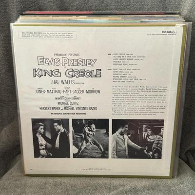 Sale Photo Thumbnail #10: King Creole, the soundtrack from the 1958 film starring Elvis Presley. 
Here's information about the album:
Artist and Title: The album is by Elvis Presley and is titled King Creole.
Release Information: It was released by RCA Victor in September 1958 wit