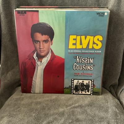 Sale Photo Thumbnail #16: "Kissin' Cousins" soundtrack album by Elvis Presley, which was released by RCA Victor in April 1964 as LPM/LSP 2894. 
About the Album & Film:
Soundtrack Album: "Kissin' Cousins" is the eighth soundtrack album by Elvis Presley, accompanying the 1964 film o