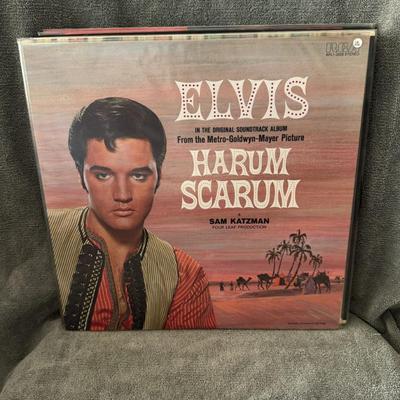Sale Photo Thumbnail #11: 1965 Metro-Goldwyn-Mayer film Harum Scarum, starring Elvis Presley. 
Here's some information about the album:
Release Information: Harum Scarum was released by RCA Victor in November 1965 and peaked at number eight on the Top LP's chart.
Content: The albu