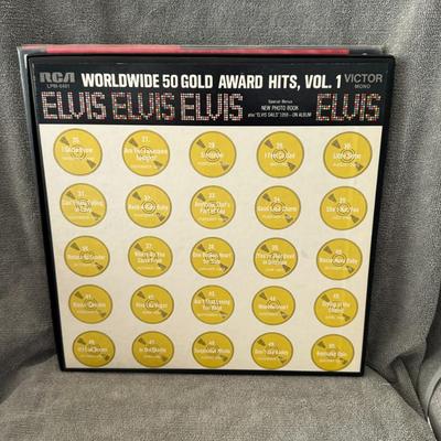 Sale Photo Thumbnail #203: Elvis Presley Worldwide 50 Gold Award Hits, Vol. 1, a compilation box set by American singer Elvis Presley. 
About the Album:
Release and Format: This four-record set was released in August 1970 by RCA Victor as Presley's 38th album. It's a 33 rpm 12" LP 