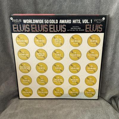 Sale Photo Thumbnail #202: Elvis Presley Worldwide 50 Gold Award Hits, Vol. 1, a compilation box set by American singer Elvis Presley. 
About the Album:
Release and Format: This four-record set was released in August 1970 by RCA Victor as Presley's 38th album. It's a 33 rpm 12" LP 