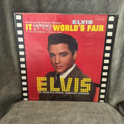Sale Photo Thumbnail #3: Elvis Presley's "It Happened at the World's Fair". 
Information about the album includes:
Release: The sixth soundtrack album by Elvis Presley, released by RCA Victor in April 1963.
Source: The soundtrack for the 1963 film of the same name, starring Elvis