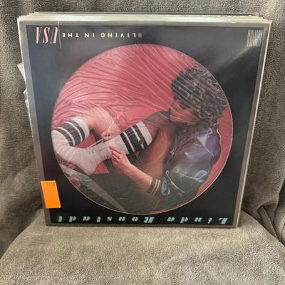 Sale Photo Thumbnail #254: "Living in the USA" by Linda Ronstadt.
Here's some information about this album:
Release Information: "Living in the USA" is the ninth studio album by American singer Linda Ronstadt, released in September 1978 by Asylum Records.
Commercial Success: It bec