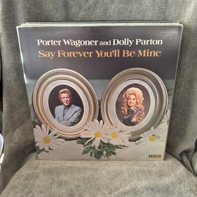 Sale Photo Thumbnail #248: "Say Forever You'll Be Mine" by Porter Wagoner and Dolly Parton. 
Here's some information about the album:
Artists: Porter Wagoner and Dolly Parton.
Release Date: August 18, 1975.
Record Label: RCA Victor.
Album Significance: It was the twelfth collaborat