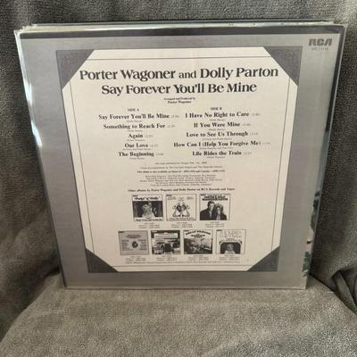 Sale Photo Thumbnail #249: "Say Forever You'll Be Mine" by Porter Wagoner and Dolly Parton. 
Here's some information about the album:
Artists: Porter Wagoner and Dolly Parton.
Release Date: August 18, 1975.
Record Label: RCA Victor.
Album Significance: It was the twelfth collaborat
