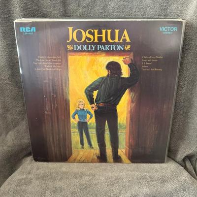 Sale Photo Thumbnail #246: "Joshua" vinyl LP album by Dolly Parton, released by RCA Victor in 1971. 
Key album details:
Release and Significance: "Joshua" is Dolly Parton's seventh solo studio album, released on April 12, 1971. The title track, "Joshua," was Parton's first song to 
