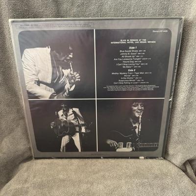 Sale Photo Thumbnail #211: "Elvis In Person at the International Hotel, Las Vegas, Nevada" by Elvis Presley. 
Here is information about the album:
Release Information: The album was recorded live at the International Hotel in Las Vegas in August 1969 and released in October 1969 by