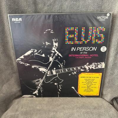 Sale Photo Thumbnail #210: "Elvis In Person at the International Hotel, Las Vegas, Nevada" by Elvis Presley. 
Here is information about the album:
Release Information: The album was recorded live at the International Hotel in Las Vegas in August 1969 and released in October 1969 by