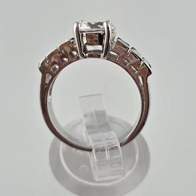 Lot 58: (3) 925 Silver Rings with Stones / 1 Fashion Ring / 21g