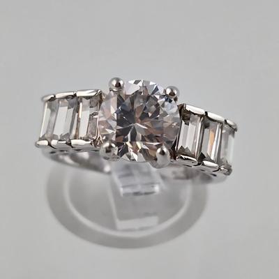 Lot 58: (3) 925 Silver Rings with Stones / 1 Fashion Ring / 21g