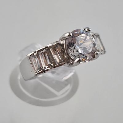 Lot 58: (3) 925 Silver Rings with Stones / 1 Fashion Ring / 21g