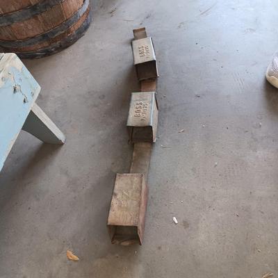 BUTCHER'S PAPER HOLDER AND CUTTER, OLD WOOD STOOL AND A METAL UNKNOWN FARMING TOOL?