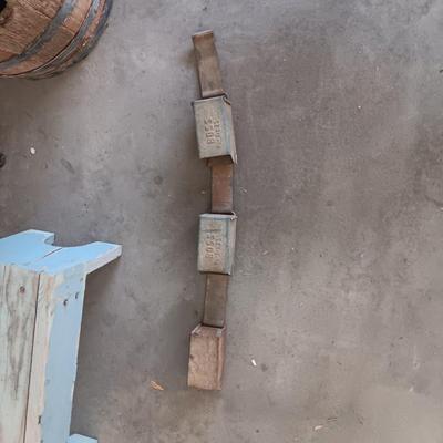 BUTCHER'S PAPER HOLDER AND CUTTER, OLD WOOD STOOL AND A METAL UNKNOWN FARMING TOOL?