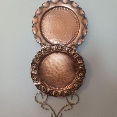 GREGORIAN COPPER PLATTERS AND A WALL HUNG PLATE HOLDER