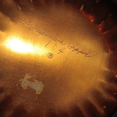 GREGORIAN COPPER PLATTERS AND A WALL HUNG PLATE HOLDER