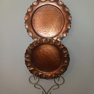 GREGORIAN COPPER PLATTERS AND A WALL HUNG PLATE HOLDER