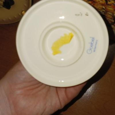 2 HUMMEL PLATES AND A HUMMEL FIGURINE "THE LOVE LIVES ON" WITH BOXES