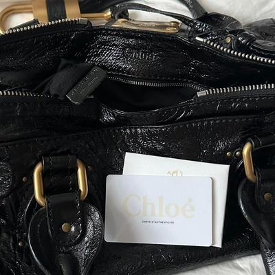 Sale Photo Thumbnail #3: • iconic 2000s / 2010s chloe paddington shoulder bag ???
• in lovely condition
• signs of wear on the hardware
• functional padlock
• can fit so much inside
• bag is literally to die for & the pics do not do it justice
• patent black
• sou