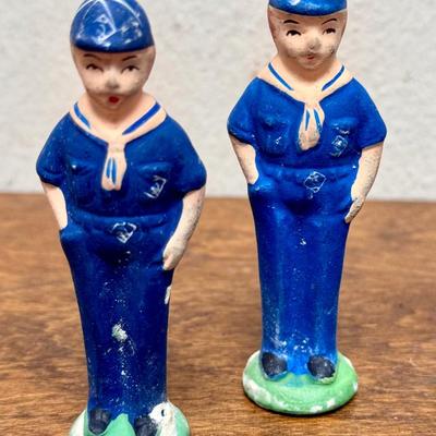 Sale Photo Thumbnail #32: Set of 4 Cub Scout figurines.  The one on the right end has been repaired, the head was glued back on (not very noticeable). Approx. 3” tall.