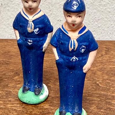 Sale Photo Thumbnail #33: Set of 4 Cub Scout figurines.  The one on the right end has been repaired, the head was glued back on (not very noticeable). Approx. 3” tall.