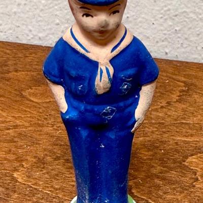 Sale Photo Thumbnail #36: Set of 4 Cub Scout figurines.  The one on the right end has been repaired, the head was glued back on (not very noticeable). Approx. 3” tall.