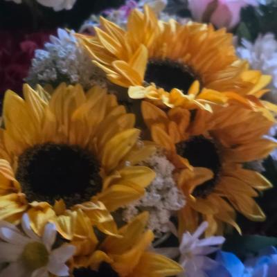 A BOX OF FAUX FLOWERS