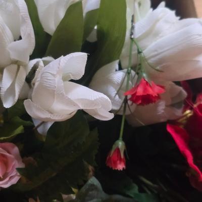 A BOX OF FAUX FLOWERS