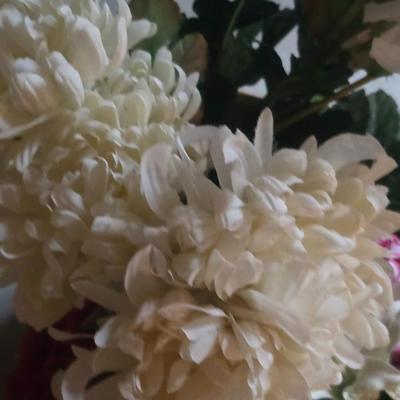 A BOX OF FAUX FLOWERS