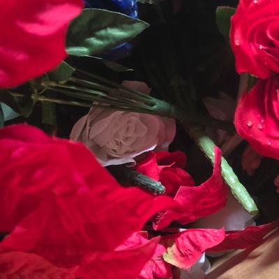 A BOX OF FAUX FLOWERS