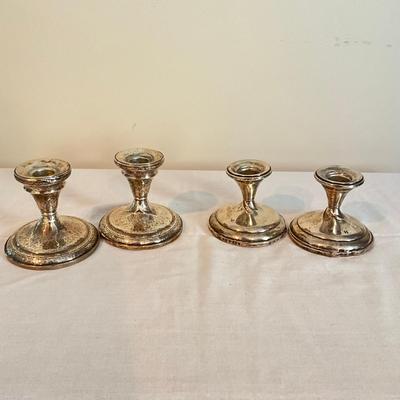 820 Two Pairs Of Weighted Silver Candlesticks