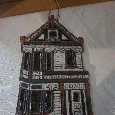CERAMIC HOUSE HOT PLATE AND SEVERAL GLASS CANISTERS