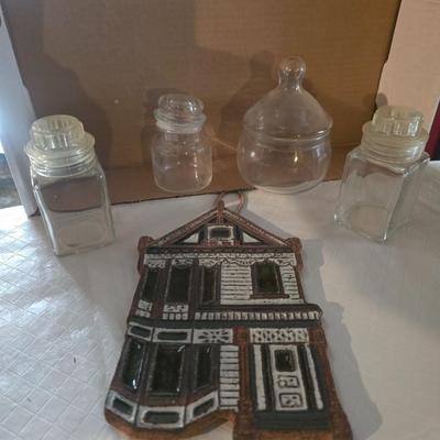 CERAMIC HOUSE HOT PLATE AND SEVERAL GLASS CANISTERS